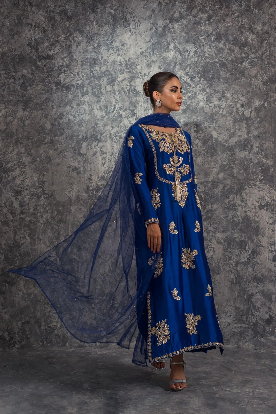 Royal Blue pakistani fashion outfit in gold, blue tones.